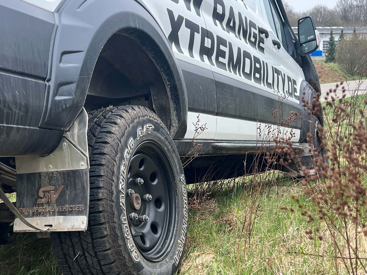 Umbereifung mit Radkastenverbreiterung und Spritzlappen