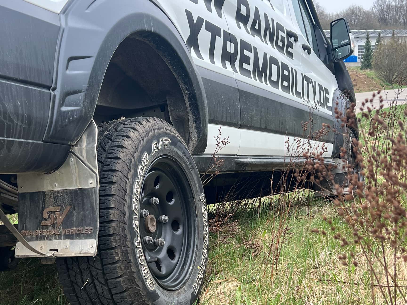 Umbereifung mit Radkastenverbreiterung und Spritzlappen